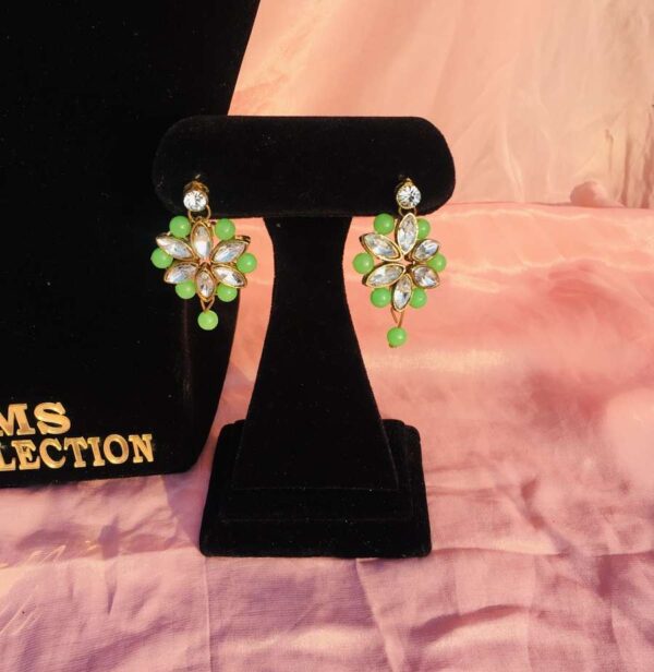 green kundan earrings