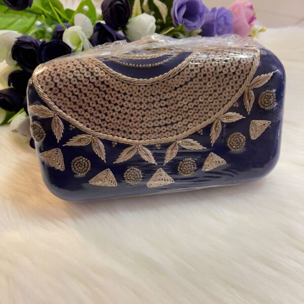 Classy Blue Clutch with a Quirky Embroidery