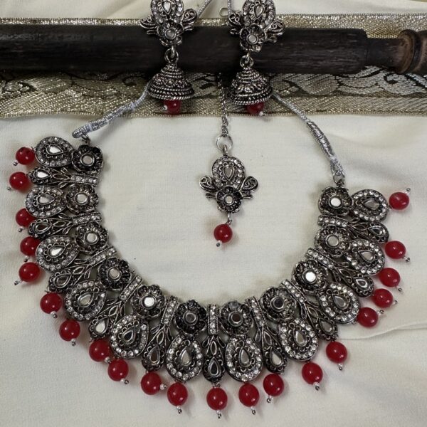 Red Beads Oxidised Jewellery with Jhumki Earrings and Tikka