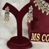 White Uncut Kundan Earrings and Tikka