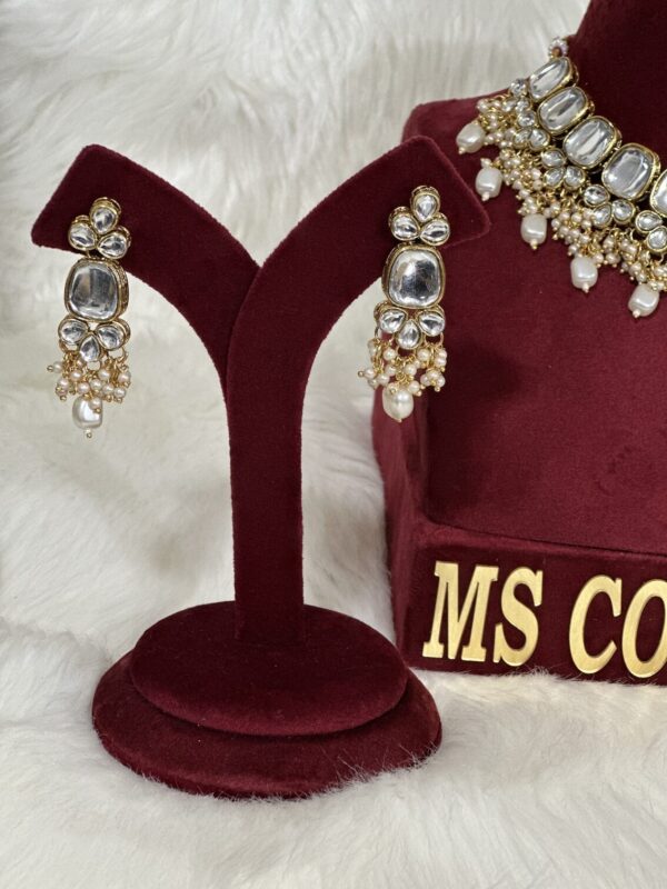 White Uncut Kundan Earrings and Tikka