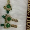 Green Kundan earrings with tikka