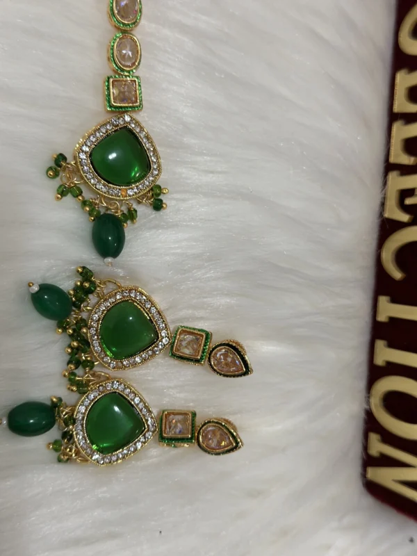 Green Kundan earrings with tikka