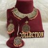 Kundan jewelry with Kundan earrings and tikka