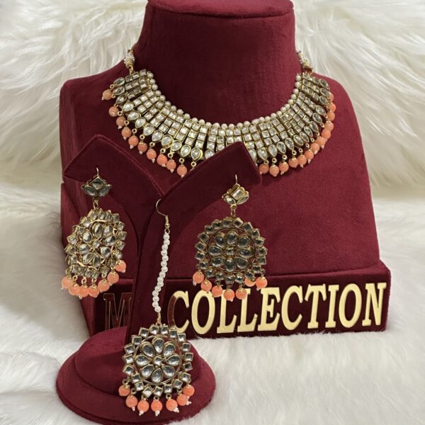 Kundan jewelry with Kundan earrings and tikka